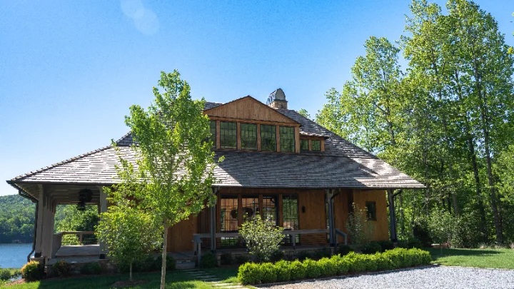 Heart-pine lake house with cedar shake roof