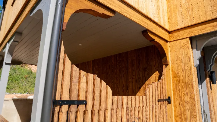 Heart-pine porch with steel doors and windows