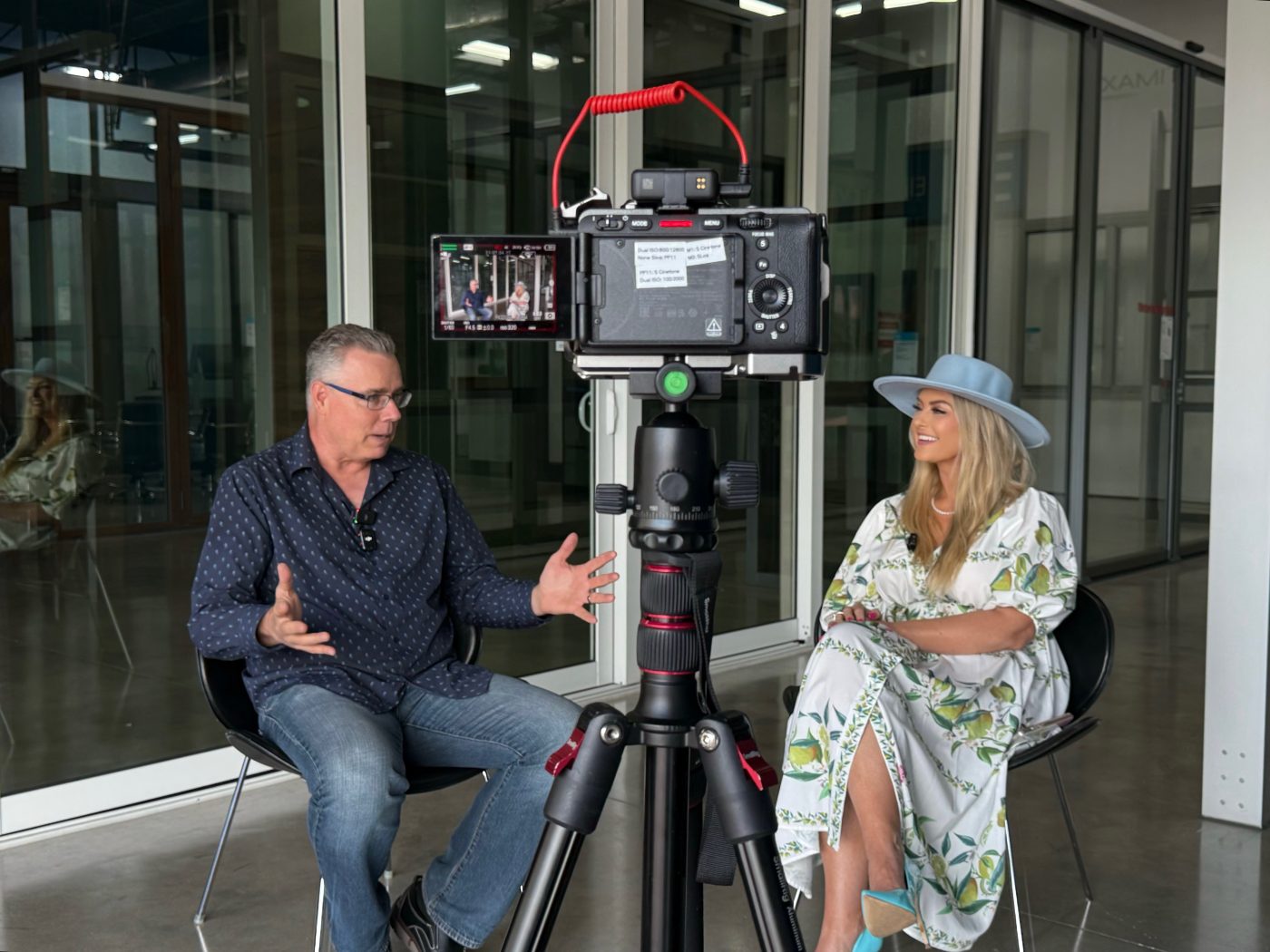 Stefanie Couch filming a Behind the Build interview