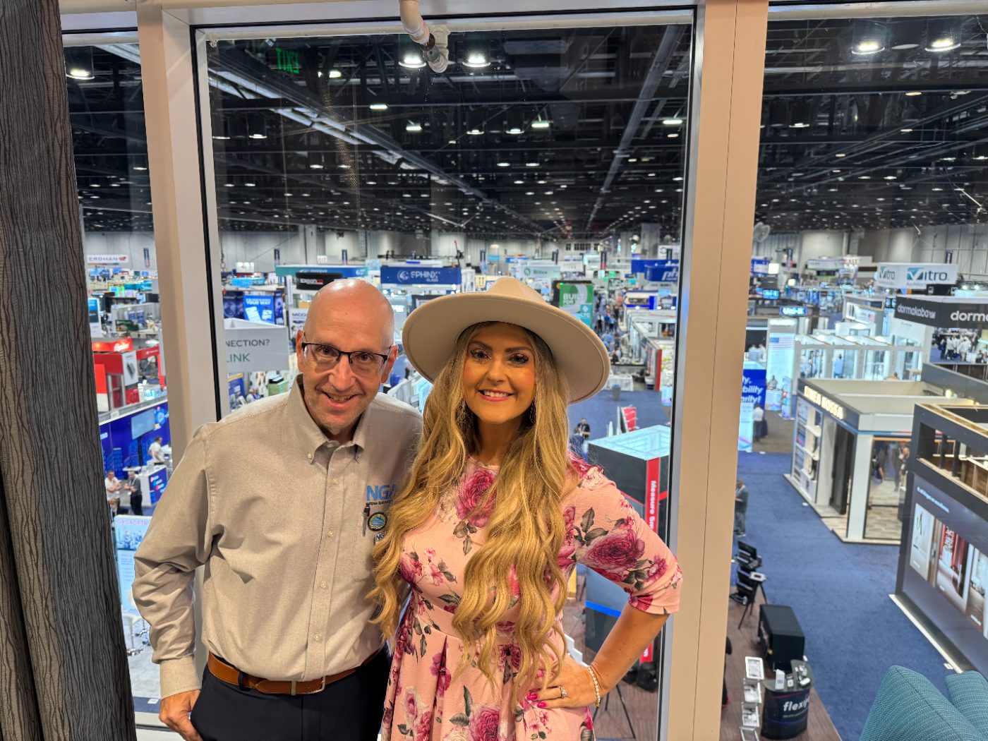 Stefanie Couch with Max Perilstein, glass industry expert and NGA partner, at GlassBuild