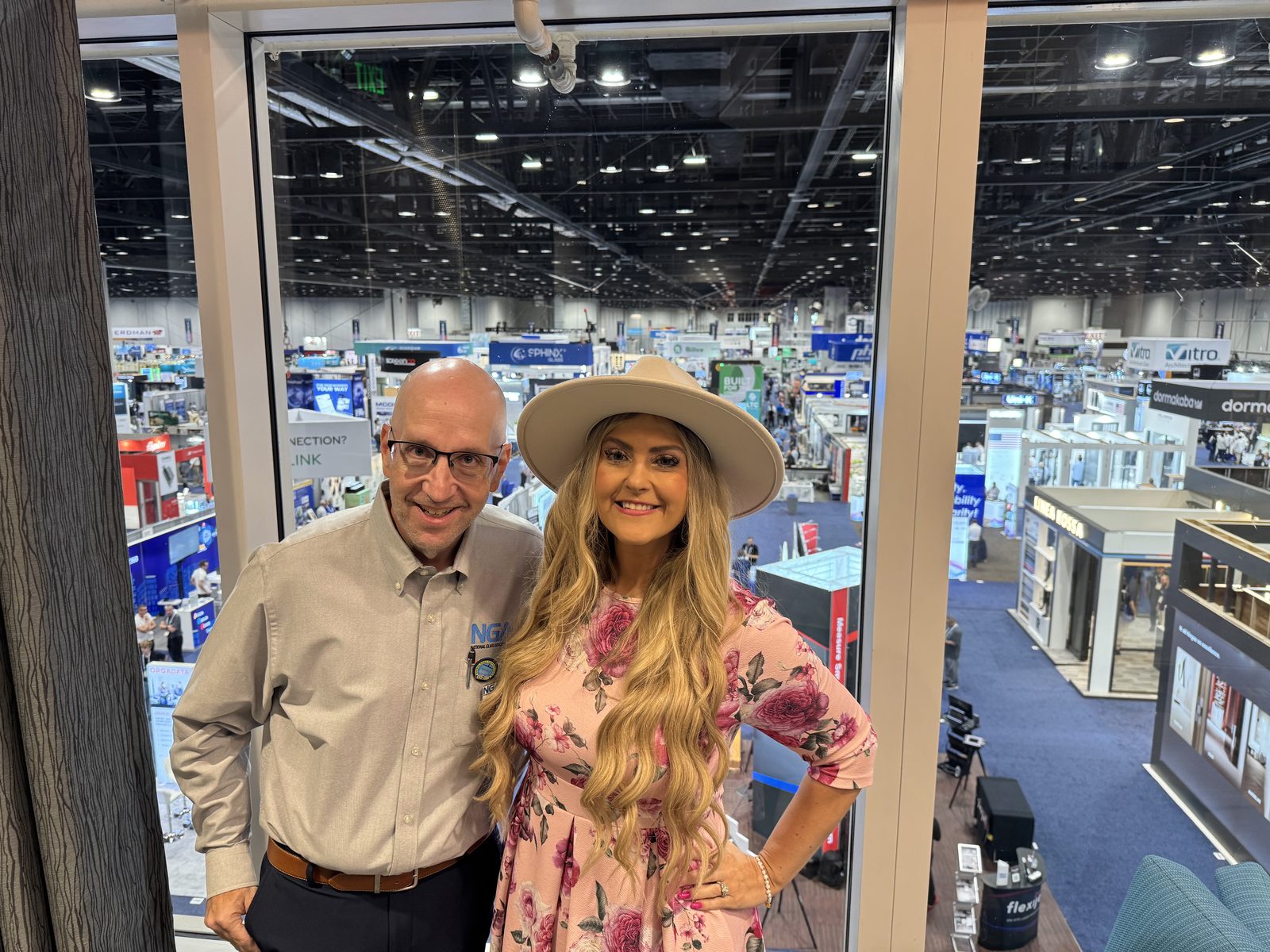 Stefanie Couch with Max Perilstein, glass industry expert and NGA partner, at GlassBuild