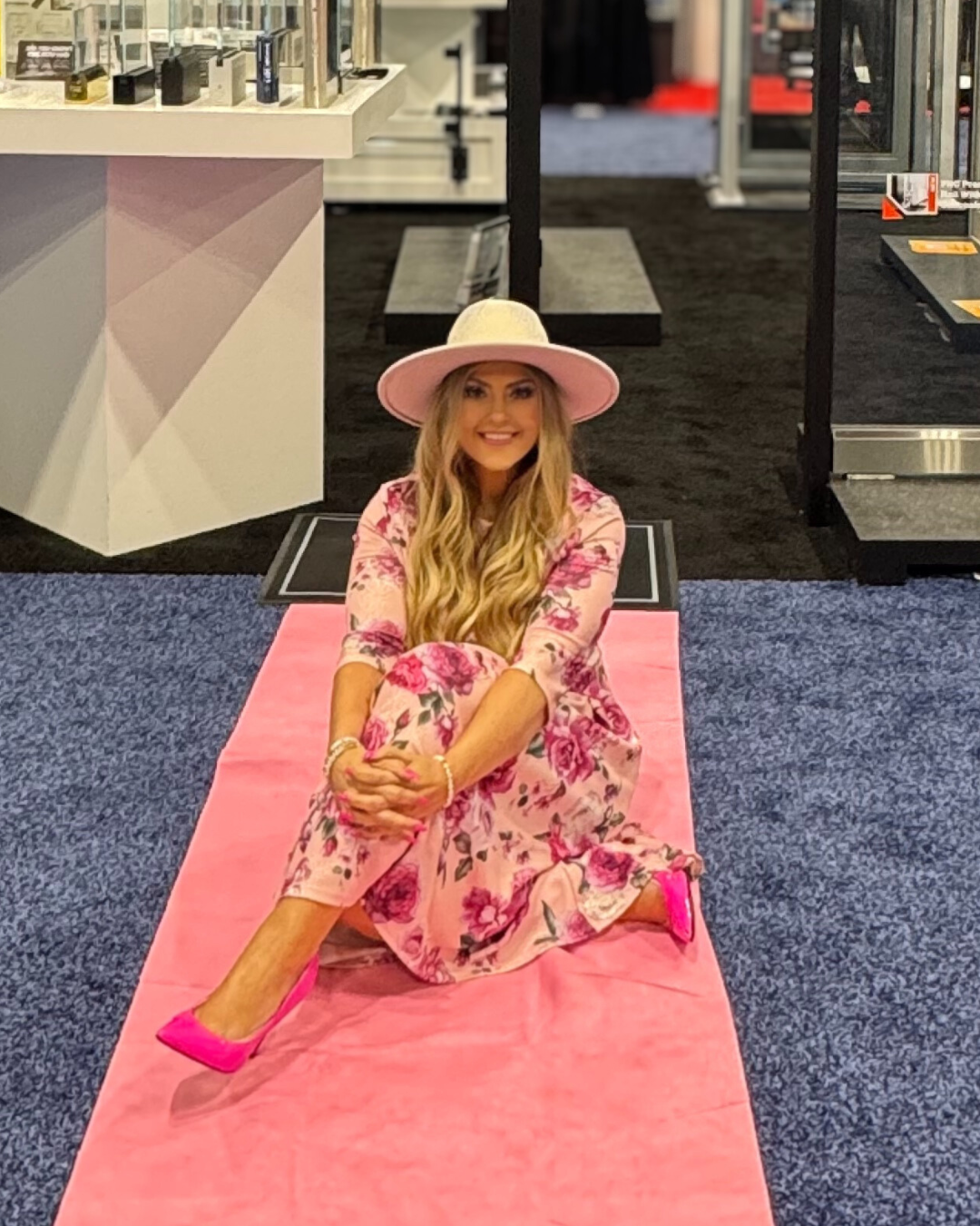 Stefanie Couch on the pink carpet at GlassBuild America