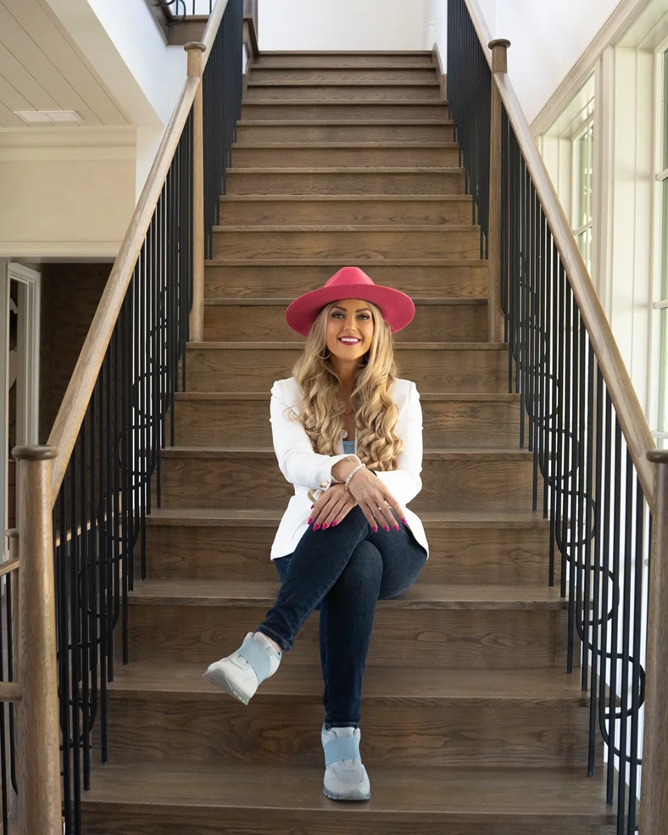 Stefanie Couch, founder of Grit Blueprint, in her signature pink hat