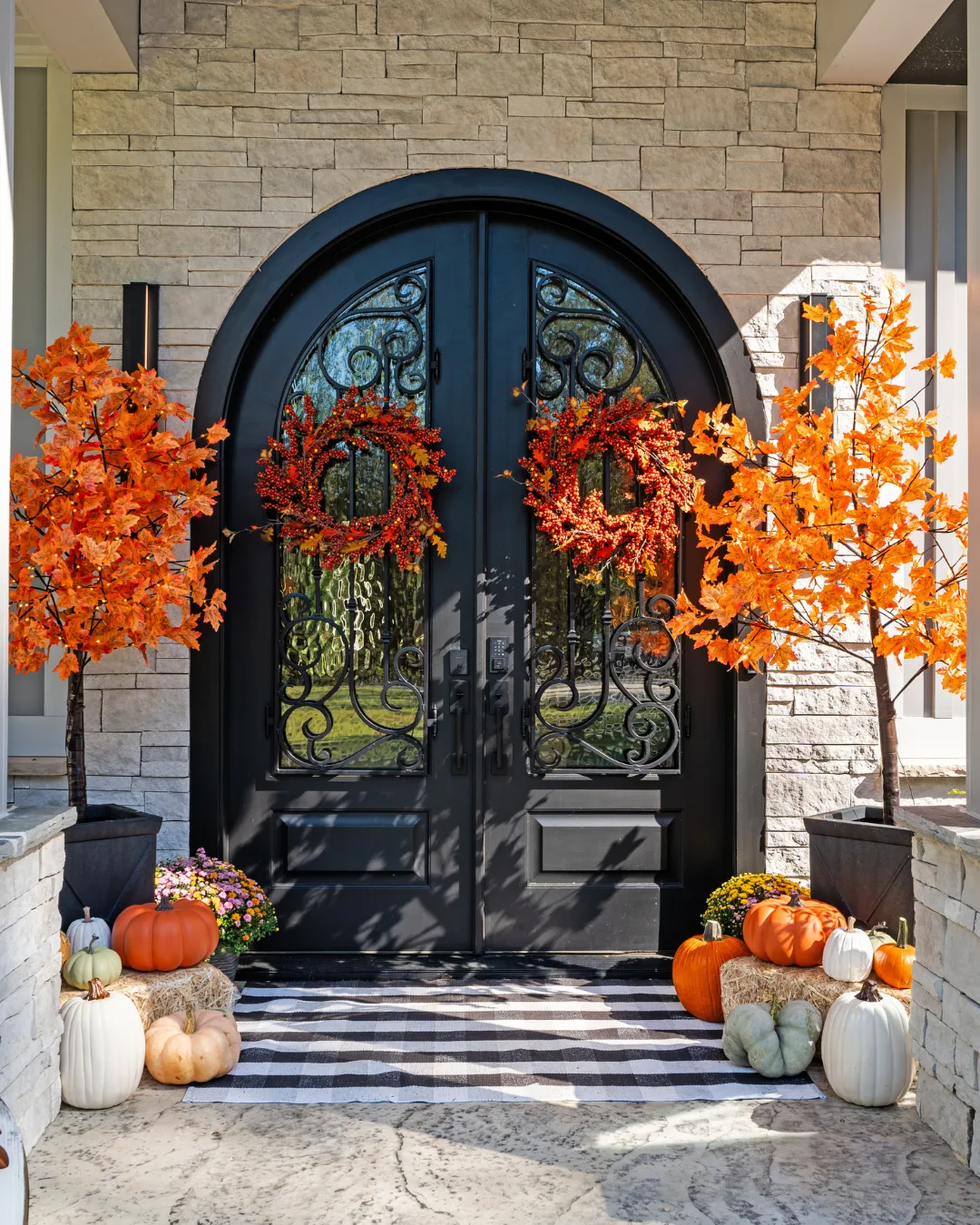 TLC Elite custom iron arched entry doors, photographed by Grit Blueprint