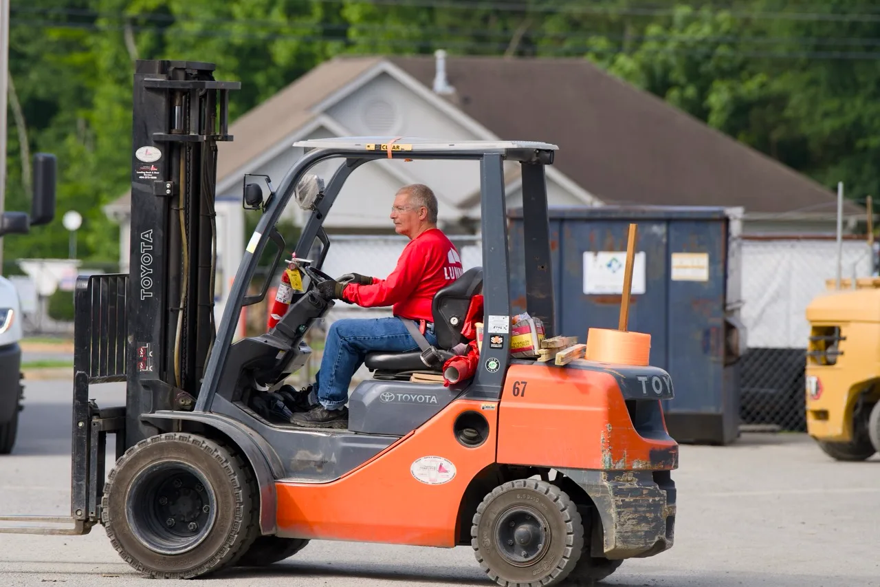 Lummus Supply forklift in the yard, photographed by Grit Blueprint