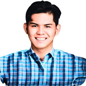 Young man smiling in a blue plaid shirt, showcasing a friendly demeanor.