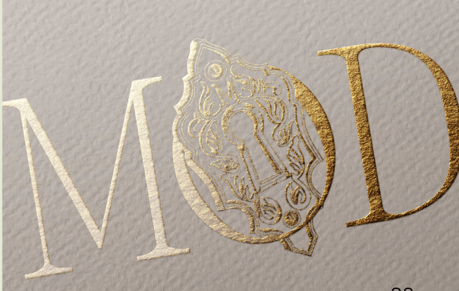 The MOD wordmark in gold foil