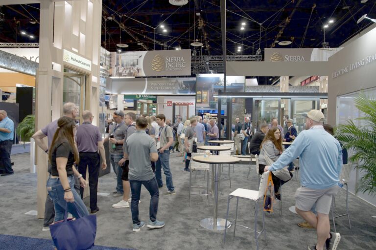 A crowd inside the Sierra Pacific Windows booth on the show floor