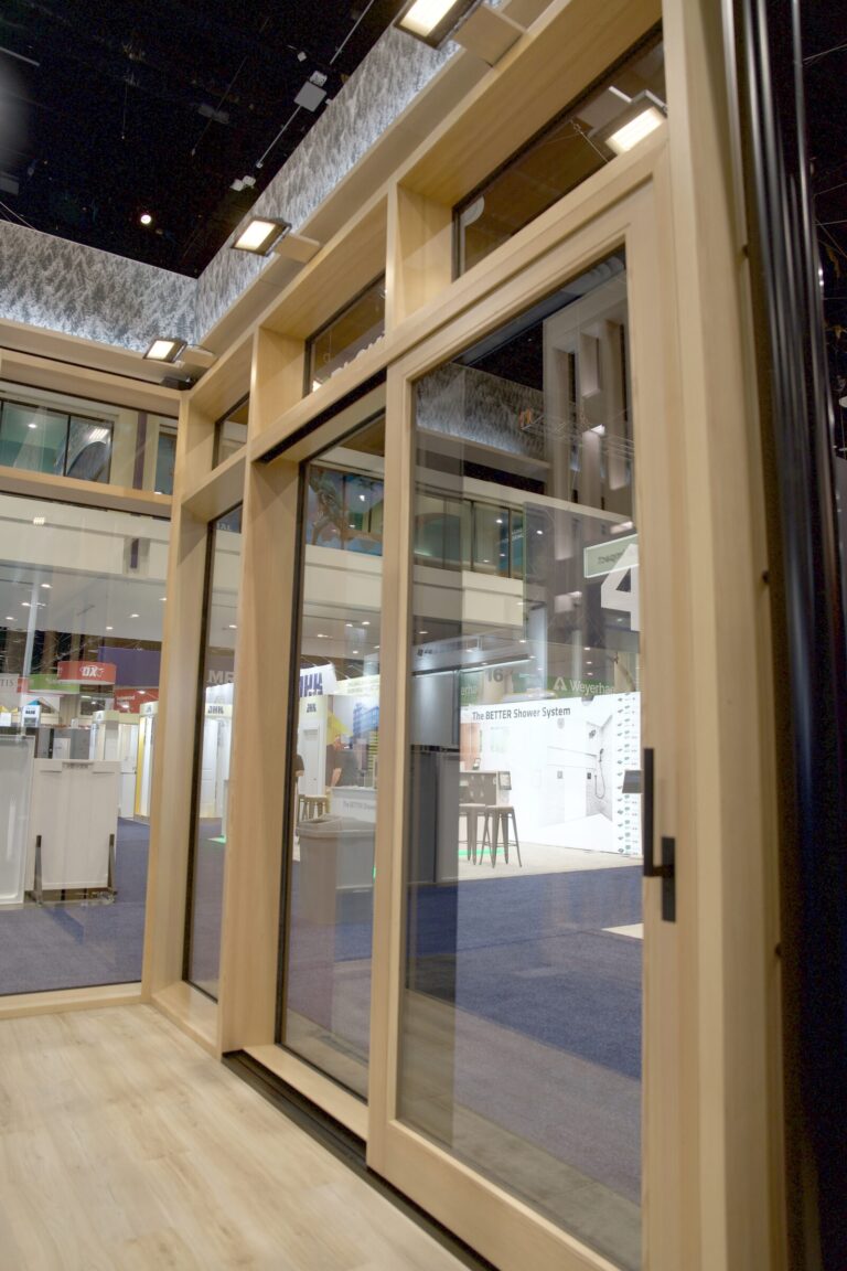 A large wood-framed sliding glass door display